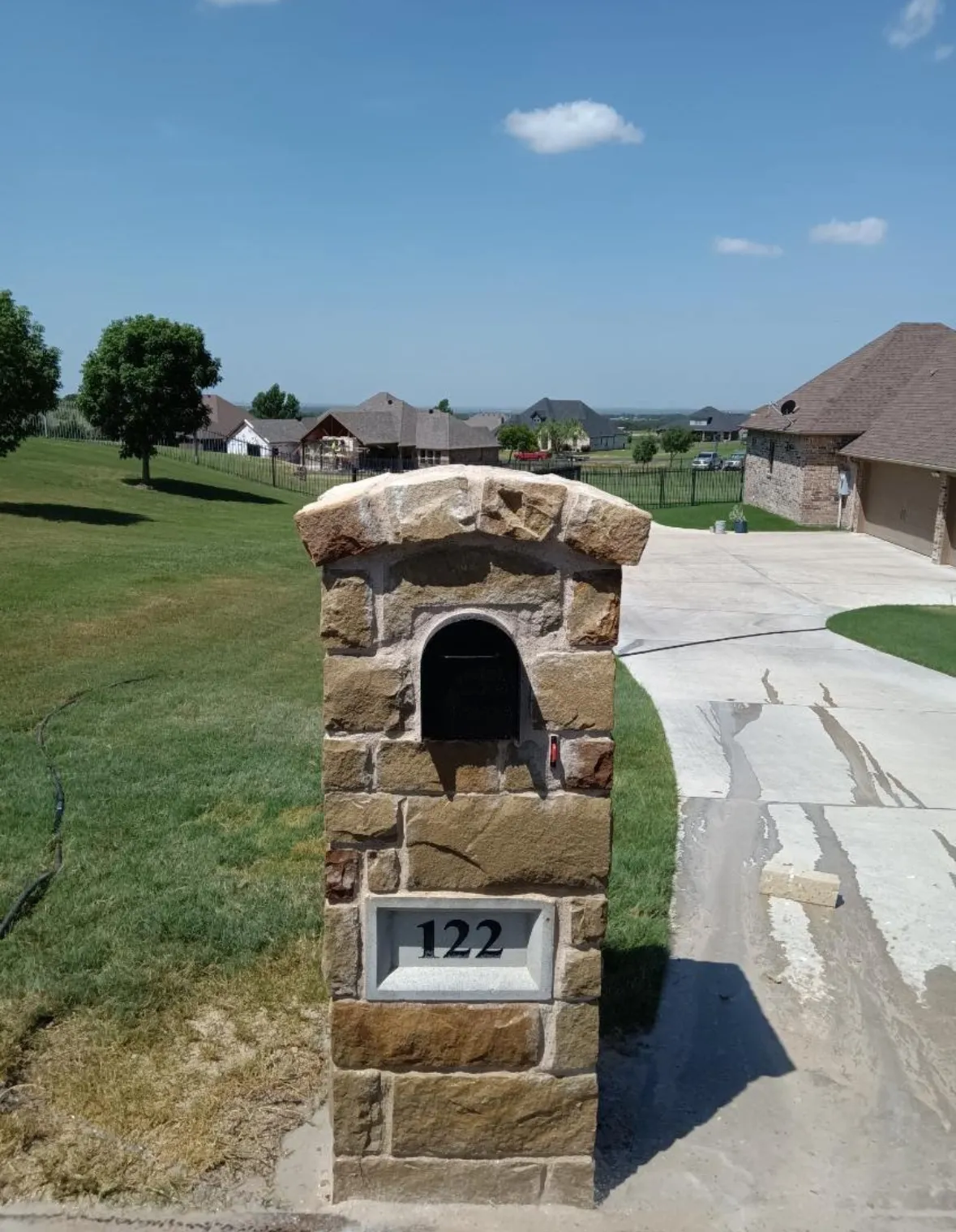 Custom natural stone mailbox built by Parker County Masonry in Parker County, Texas